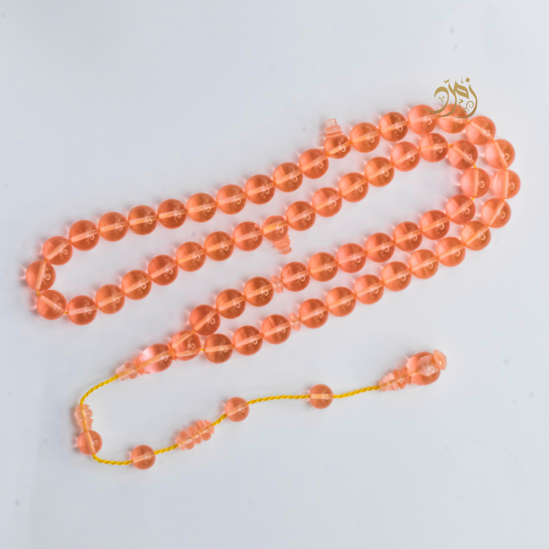 سبحة كاست لون مشمشي شفاف - دائري او برميلي