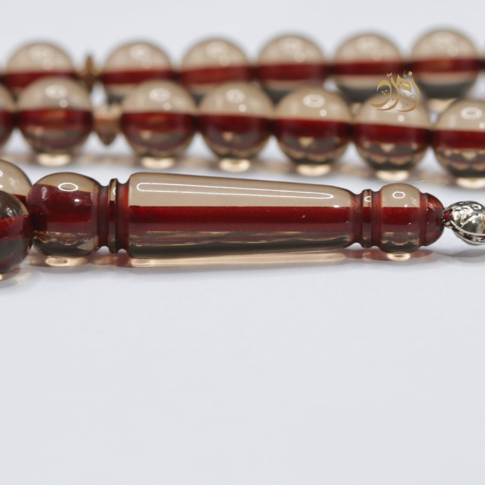 سبحة بكلايت بني شفاف 51 خرزة