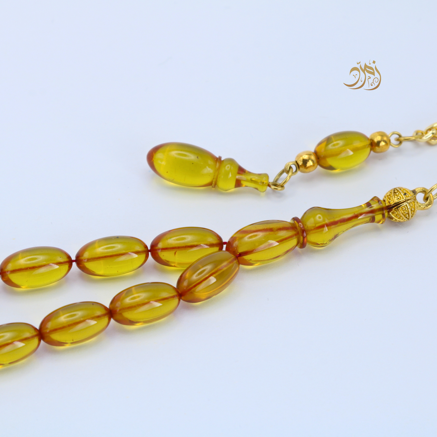 سبحة فاتوران عسلي – خراطة بوراك اوزاجيك (33 خرزة)