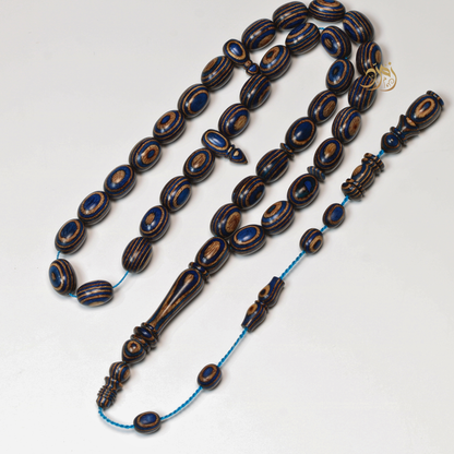 سبحة خشب كافور مضغوط أزرق عيون– 35 خرزة بيض حمام