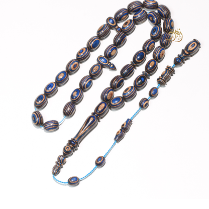 سبحة خشب كافور مضغوط أزرق عيون– 35 خرزة بيض حمام