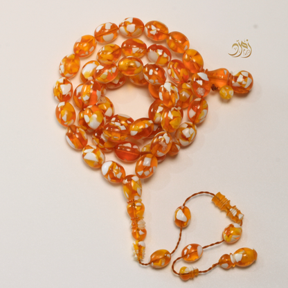 سبحة مستكة (قشطة وعسل ) غامق 45 خرزة بيض حمام (شاهد +كبوس) سبير