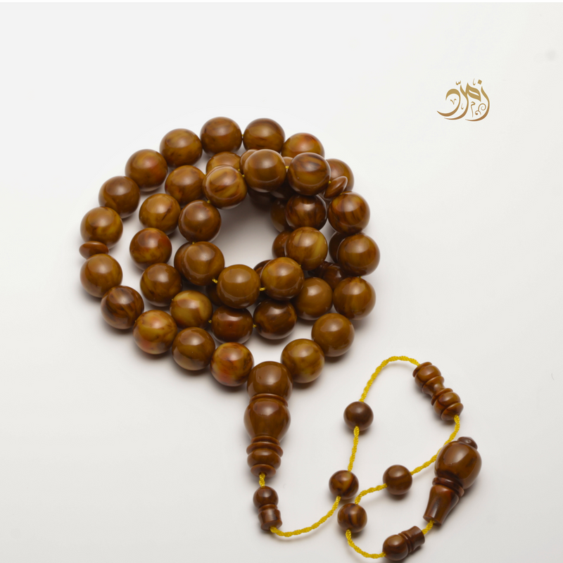 سبحة فاتوران عسلي داكن مموج – 47 خرزة دائري