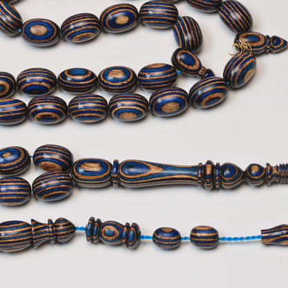 سبحة خشب كافور مضغوط أزرق عيون– 35 خرزة بيض حمام