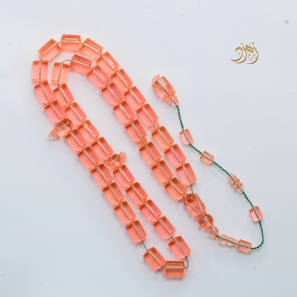 سبحة كاست لون مشمشي شفاف - دائري او برميلي