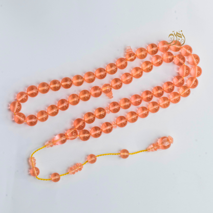 سبحة كاست لون مشمشي شفاف - دائري او برميلي