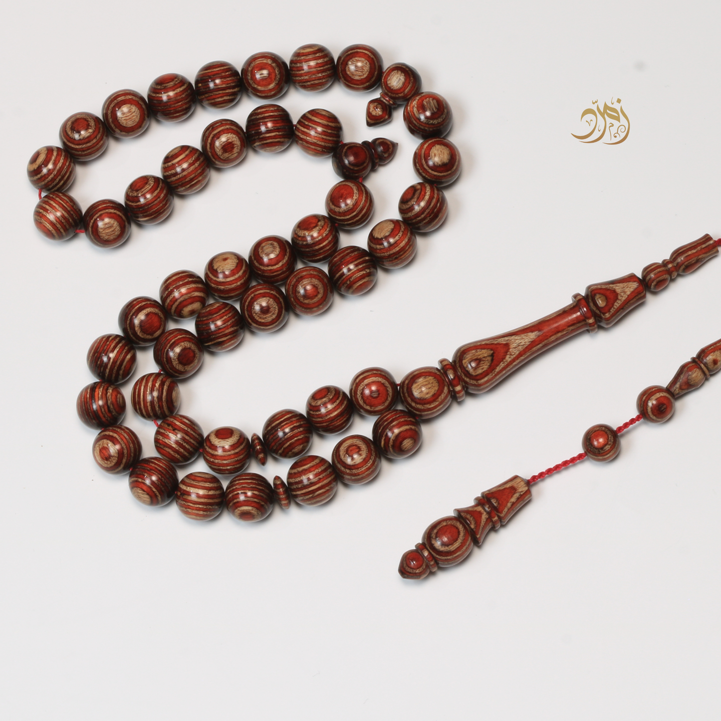 سبحة خشب كافور مضغوط عيون أحمر  – 45 خرزة دائري