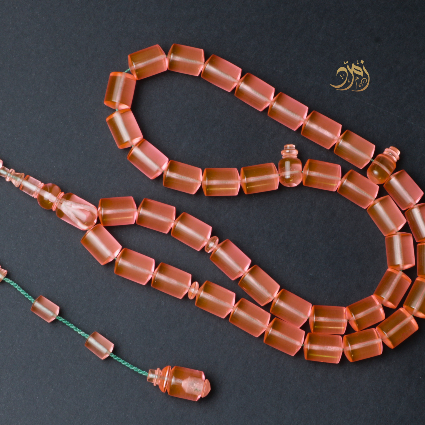 سبحة كاست لون مشمشي شفاف - دائري او برميلي