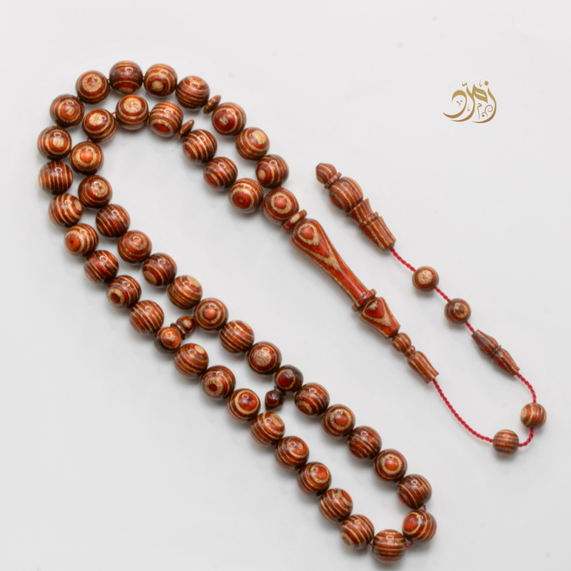 سبحة خشب كافور مضغوط عيون أحمر  – 45 خرزة دائري