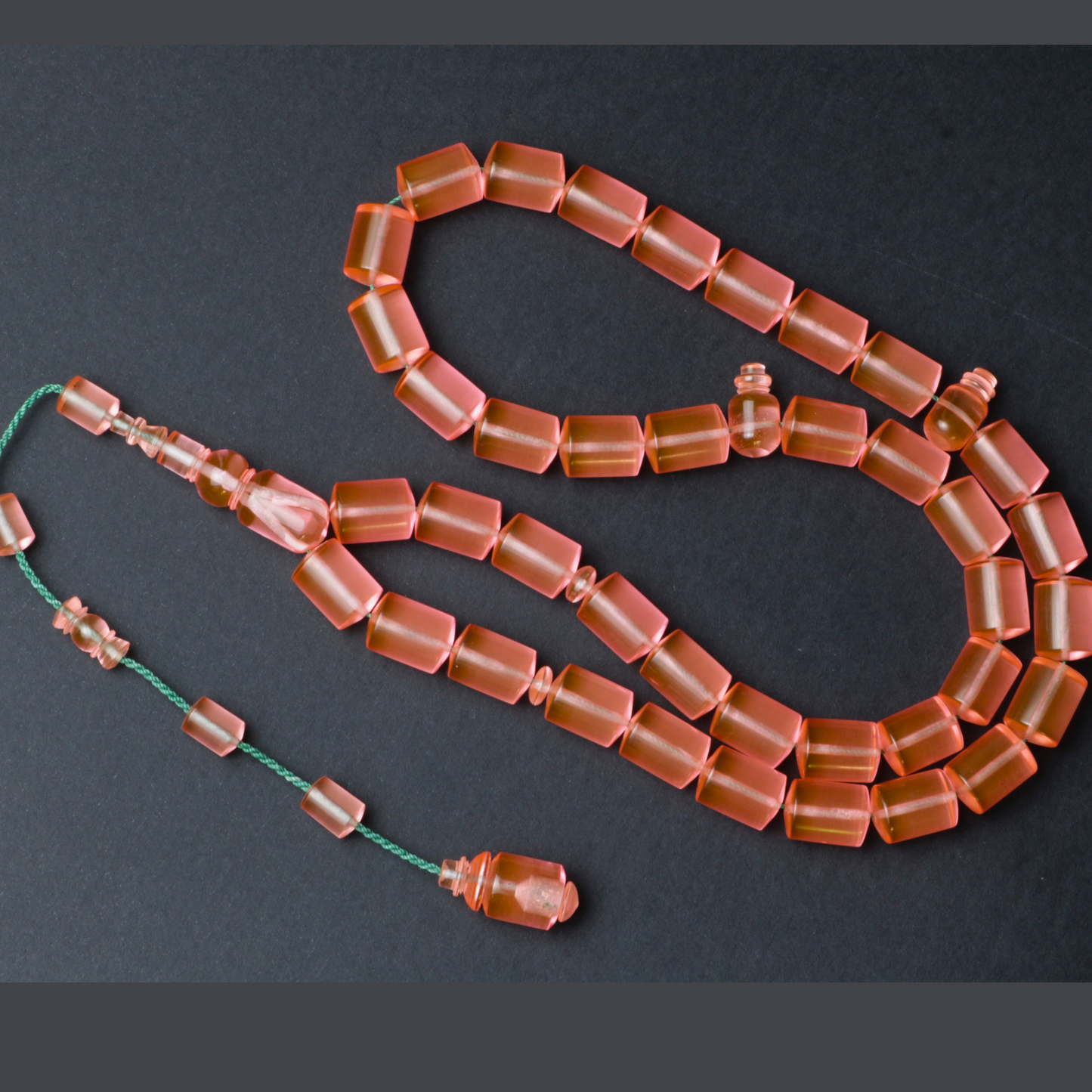 سبحة كاست لون مشمشي شفاف - دائري او برميلي