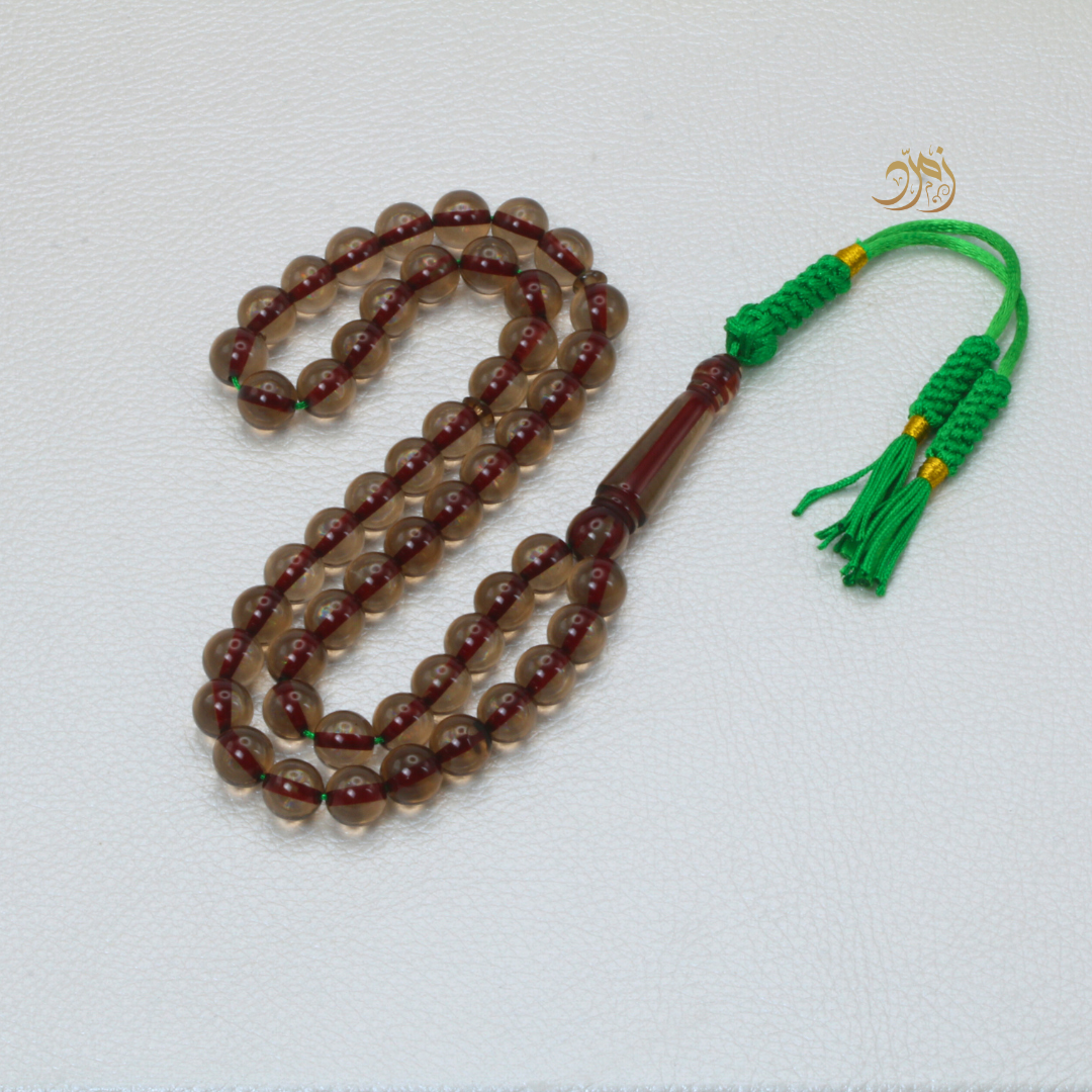 سبحة بكلايت بني شفاف 51 خرزة