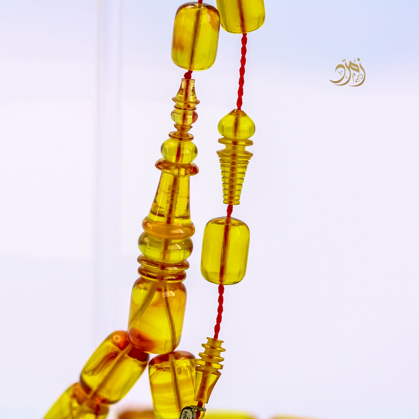 سبحة فاتوران عسلي – خام ناصر فيدان وخراطة الأسطة حسين زايد (45 خرزة)