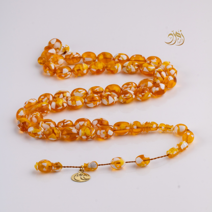 سبحة مستكة (قشطة وعسل ) غامق 45 خرزة بيض حمام (شاهد +كبوس) سبير