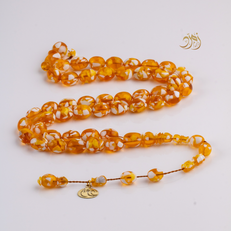 سبحة مستكة (قشطة وعسل ) غامق 45 خرزة بيض حمام (شاهد +كبوس) سبير