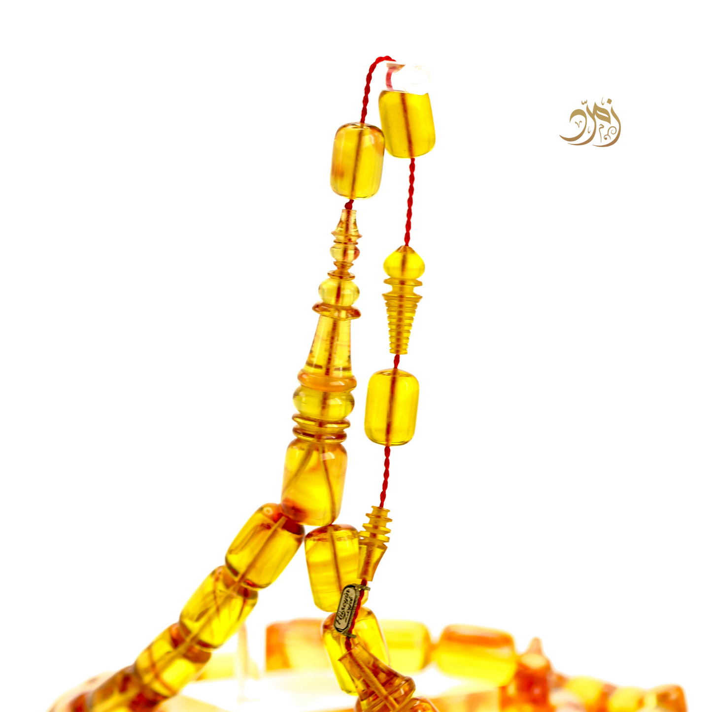 سبحة فاتوران عسلي – خام ناصر فيدان وخراطة الأسطة حسين زايد (45 خرزة)