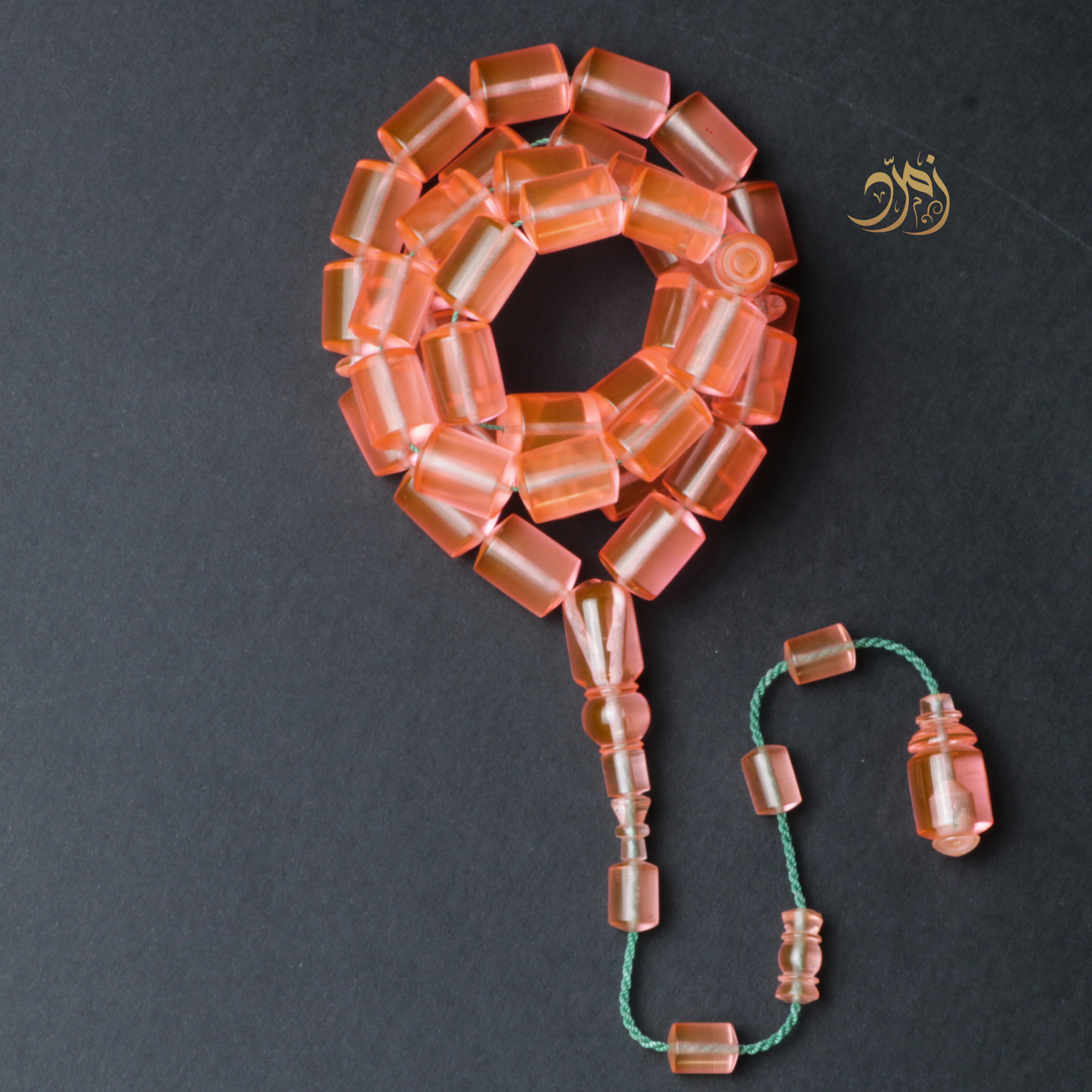 سبحة كاست لون مشمشي شفاف - دائري او برميلي