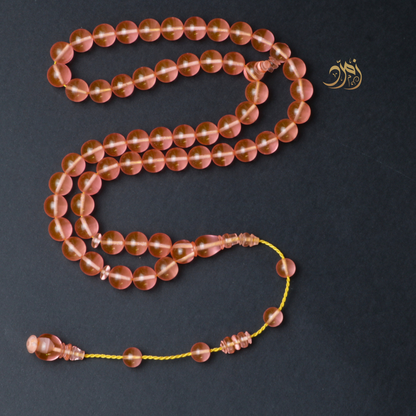 سبحة كاست لون مشمشي شفاف - دائري او برميلي