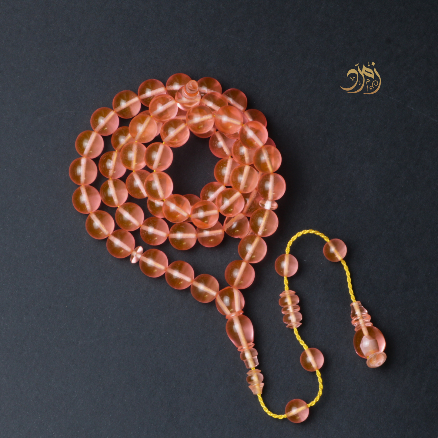 سبحة كاست لون مشمشي شفاف - دائري او برميلي