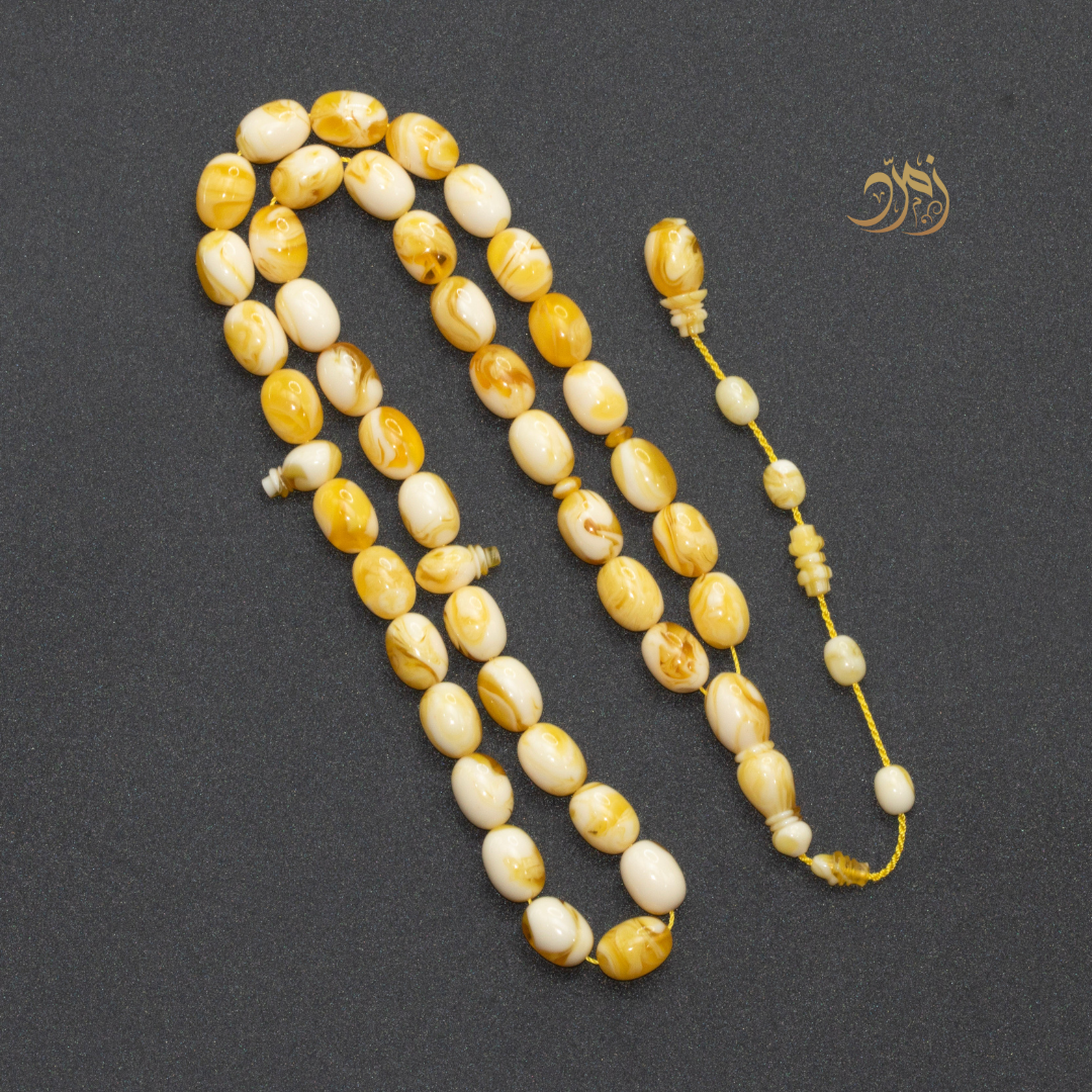 سبحة مستكة بيض حمام (غامق )– 41 خرزة