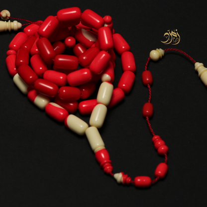 سبحة طابة بلياردو صب قدم ألماني - أحمر وعاجي - 57 خرزة - صنوبري