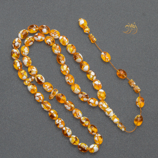 سبحة مستكة (قشطة وعسل ) غامق 45 خرزة بيض حمام (شاهد +كبوس) سبير