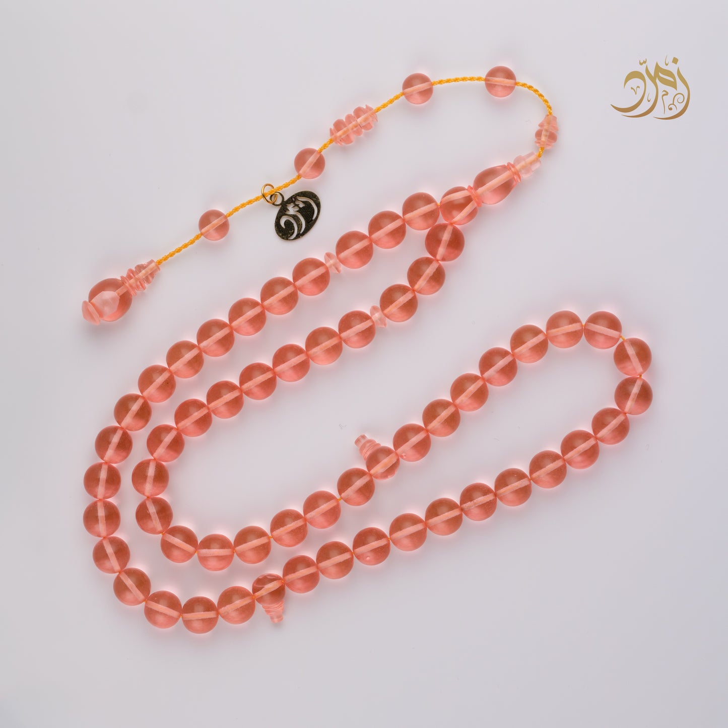 سبحة كاست لون مشمشي شفاف - دائري او برميلي