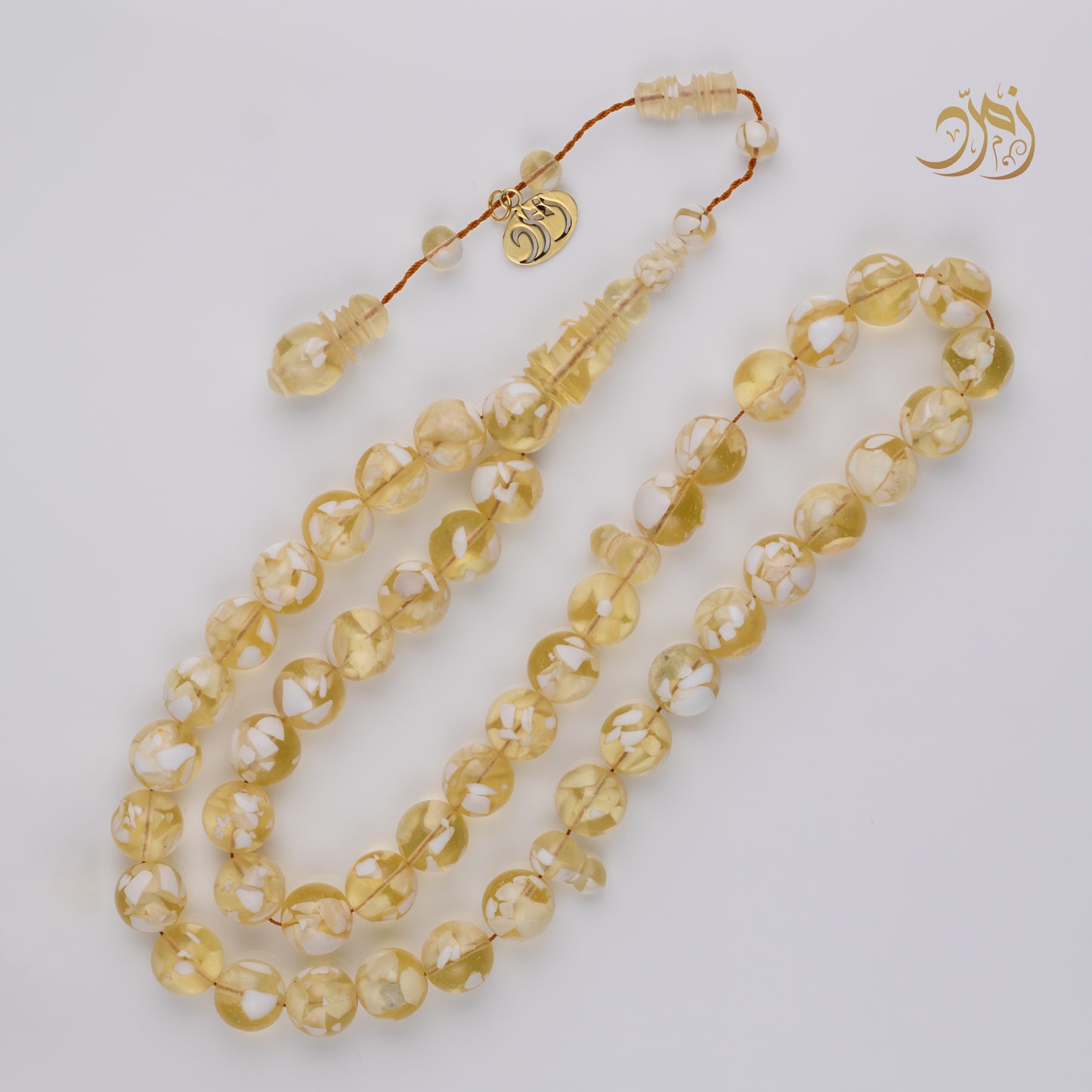 سبحة مستكة (قشطة وعسل ) فاتح 45 خرزة دائري (شاهد +كبوس) سبير