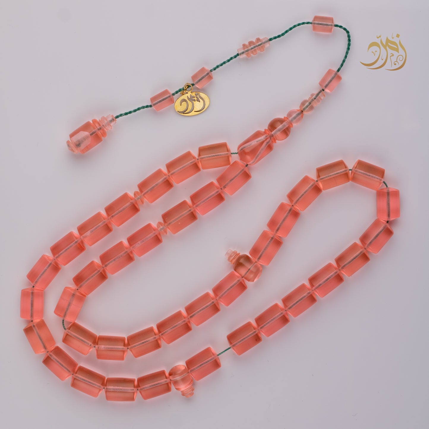 سبحة كاست لون مشمشي شفاف - دائري او برميلي