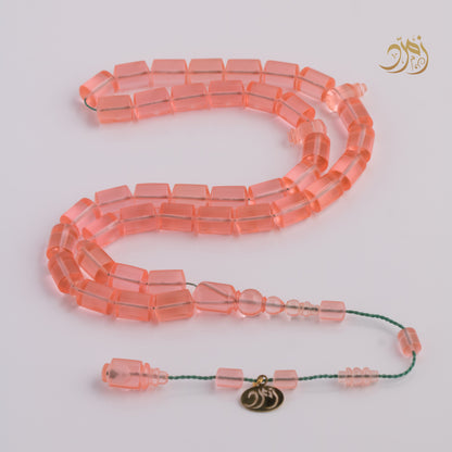 سبحة كاست لون مشمشي شفاف - دائري او برميلي