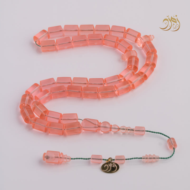 سبحة كاست لون مشمشي شفاف - دائري او برميلي