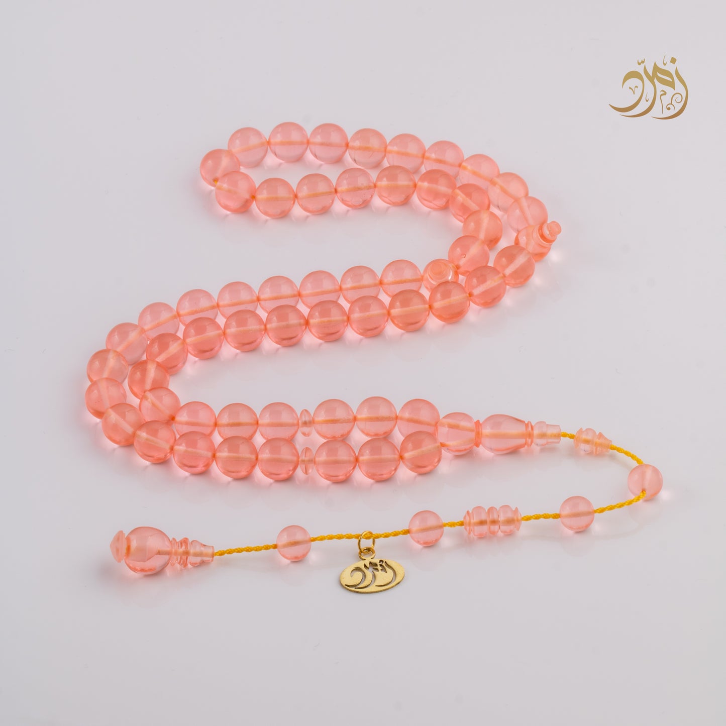 سبحة كاست لون مشمشي شفاف - دائري او برميلي