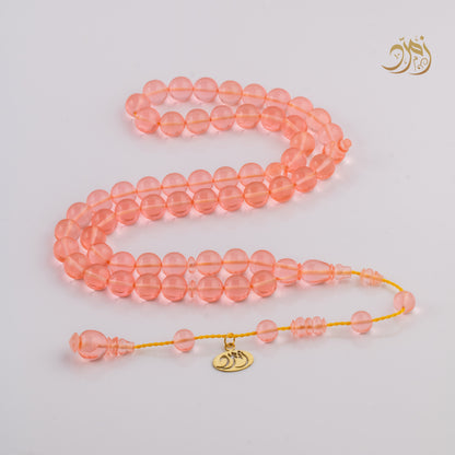 سبحة كاست لون مشمشي شفاف - دائري او برميلي