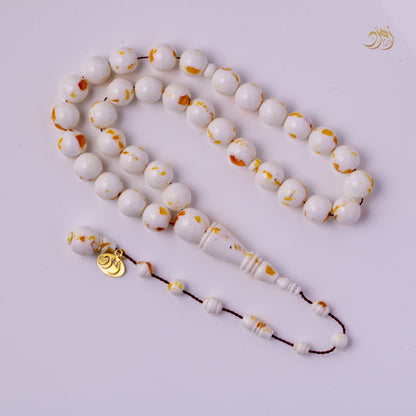 سبحة مستكة قشطة وعسل تمليكة 33 خرزة دائري