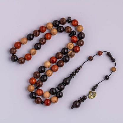 سبحة خشب منوع ماكنتوش 49 خرزة دائري