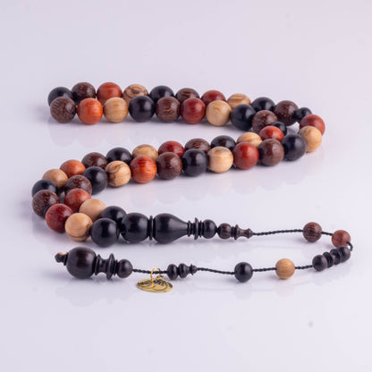 سبحة خشب منوع ماكنتوش 49 خرزة دائري