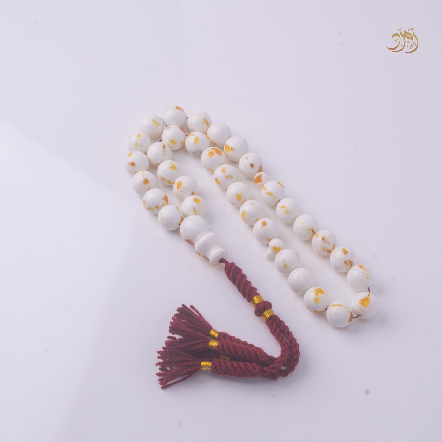 سبحة مستكة قشطة وعسل كركوشة 33 خرزة دائري