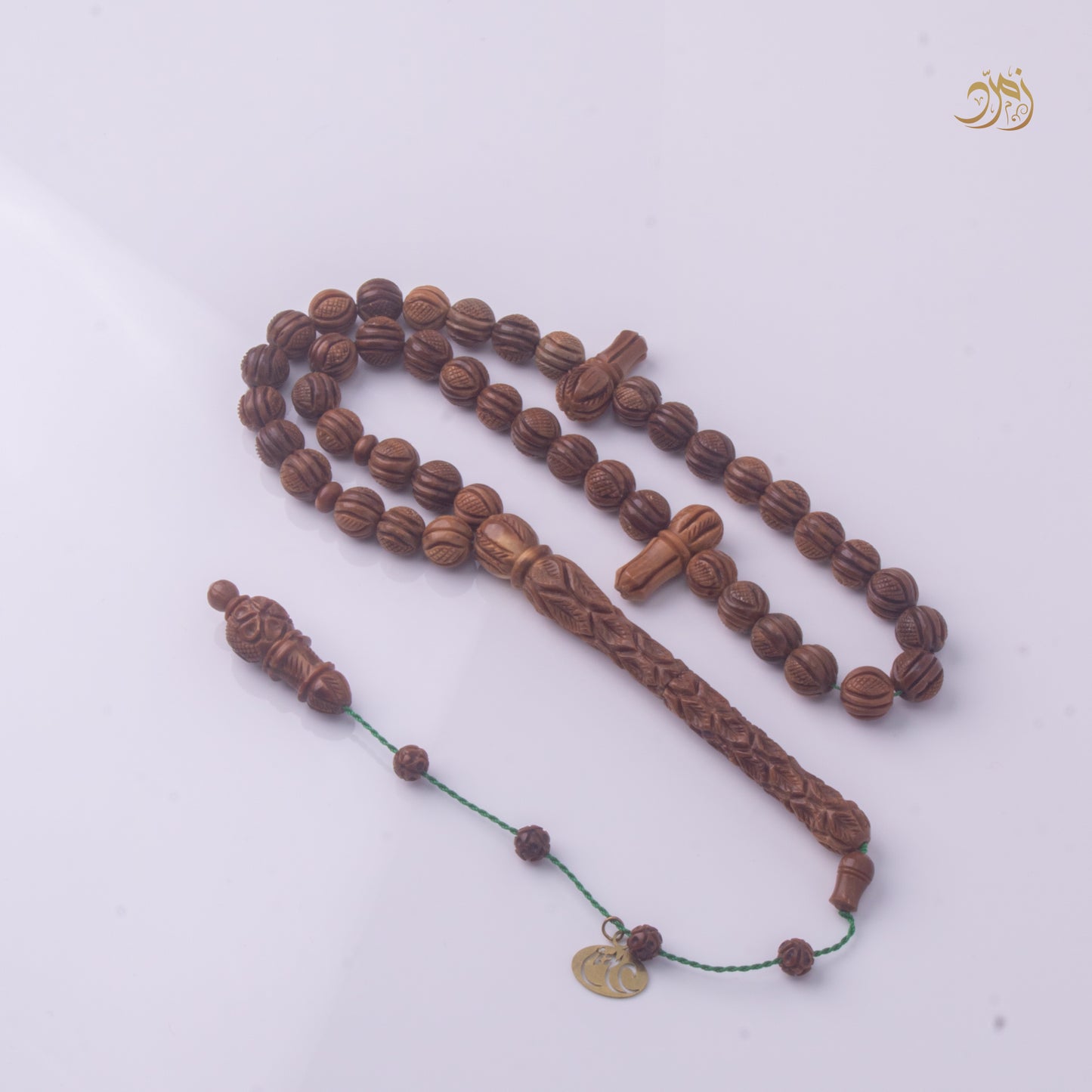 سبحة خشب كوك طبيعي منقوش يدويًا فواح برائحة العود – 43 خرزة دائري
