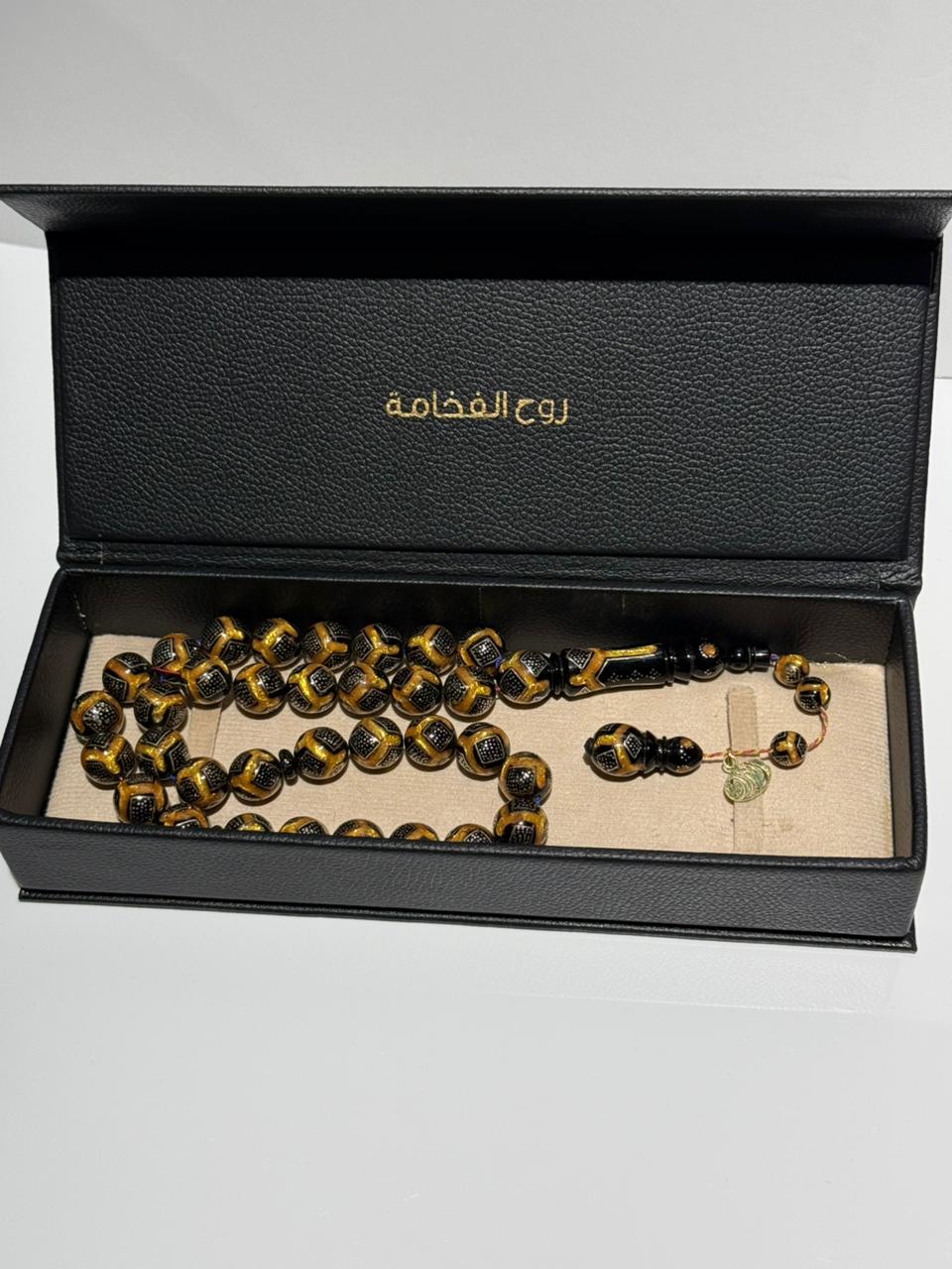 سبحة يسر طبيعي مطعم بالفضة والكهرمان 33 خرزة دائري