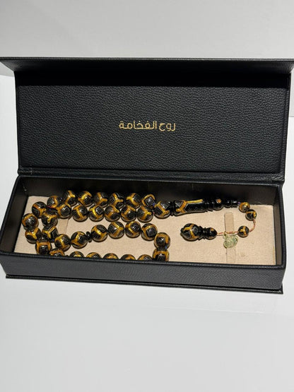 سبحة يسر طبيعي مطعم بالفضة والكهرمان 33 خرزة دائري